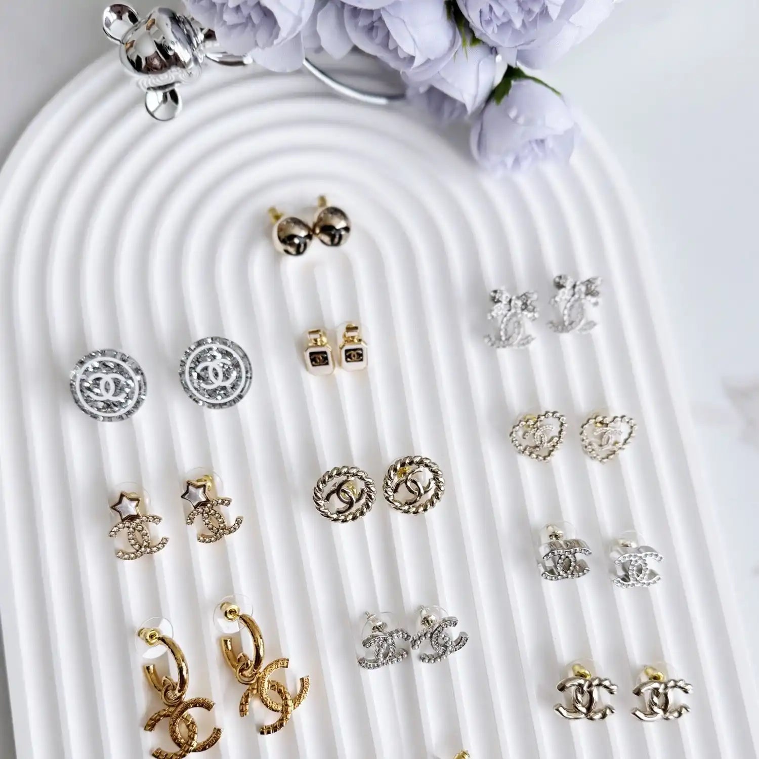 Assorted designer earrings.