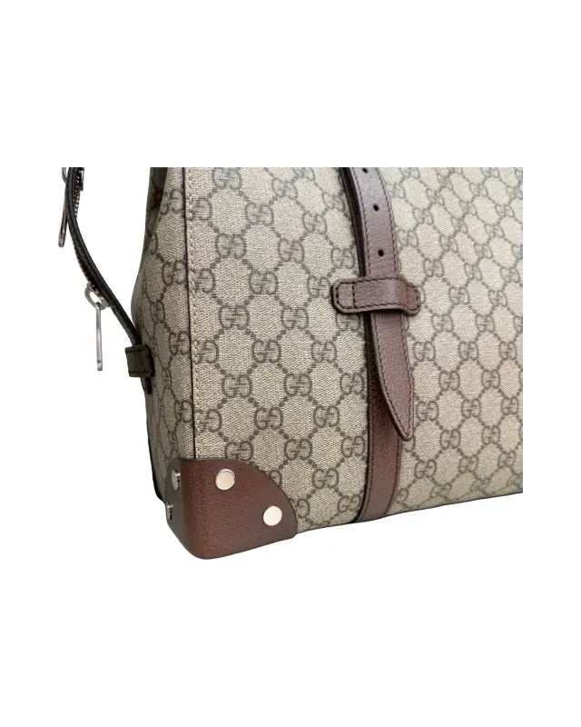 Gucci monogrammed canvas bag with leather trim, perfect for supreme tote style