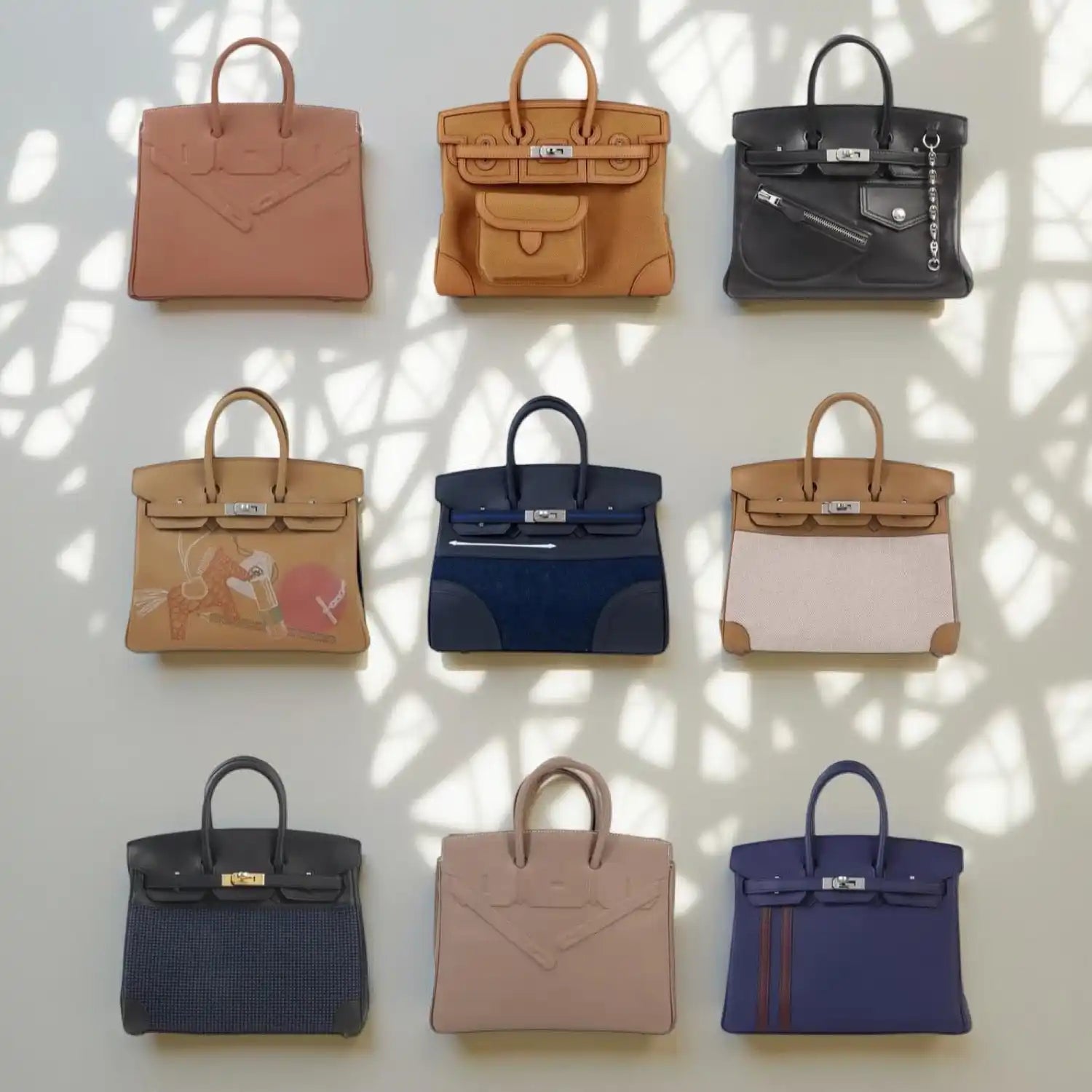Collection of luxury handbags.