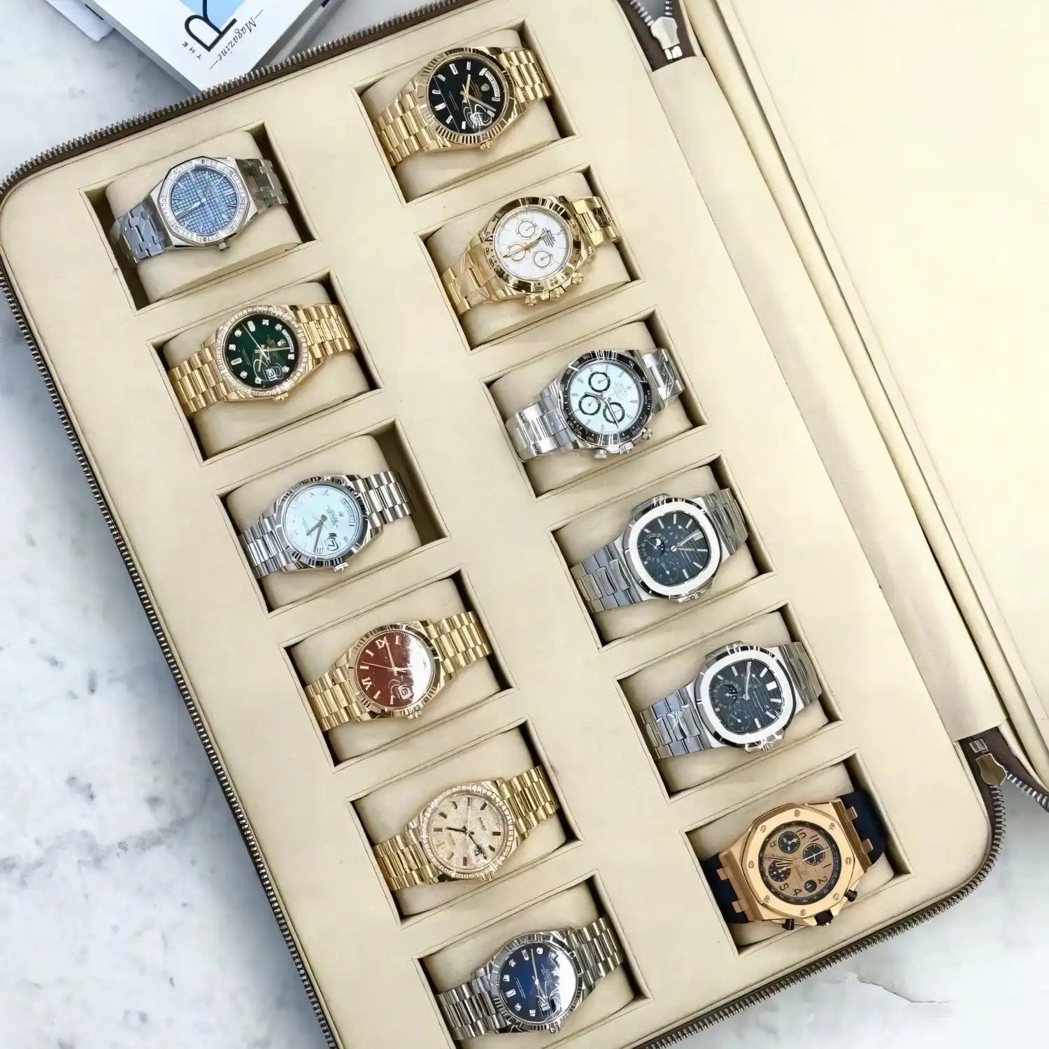 Luxury watch collection in a case.