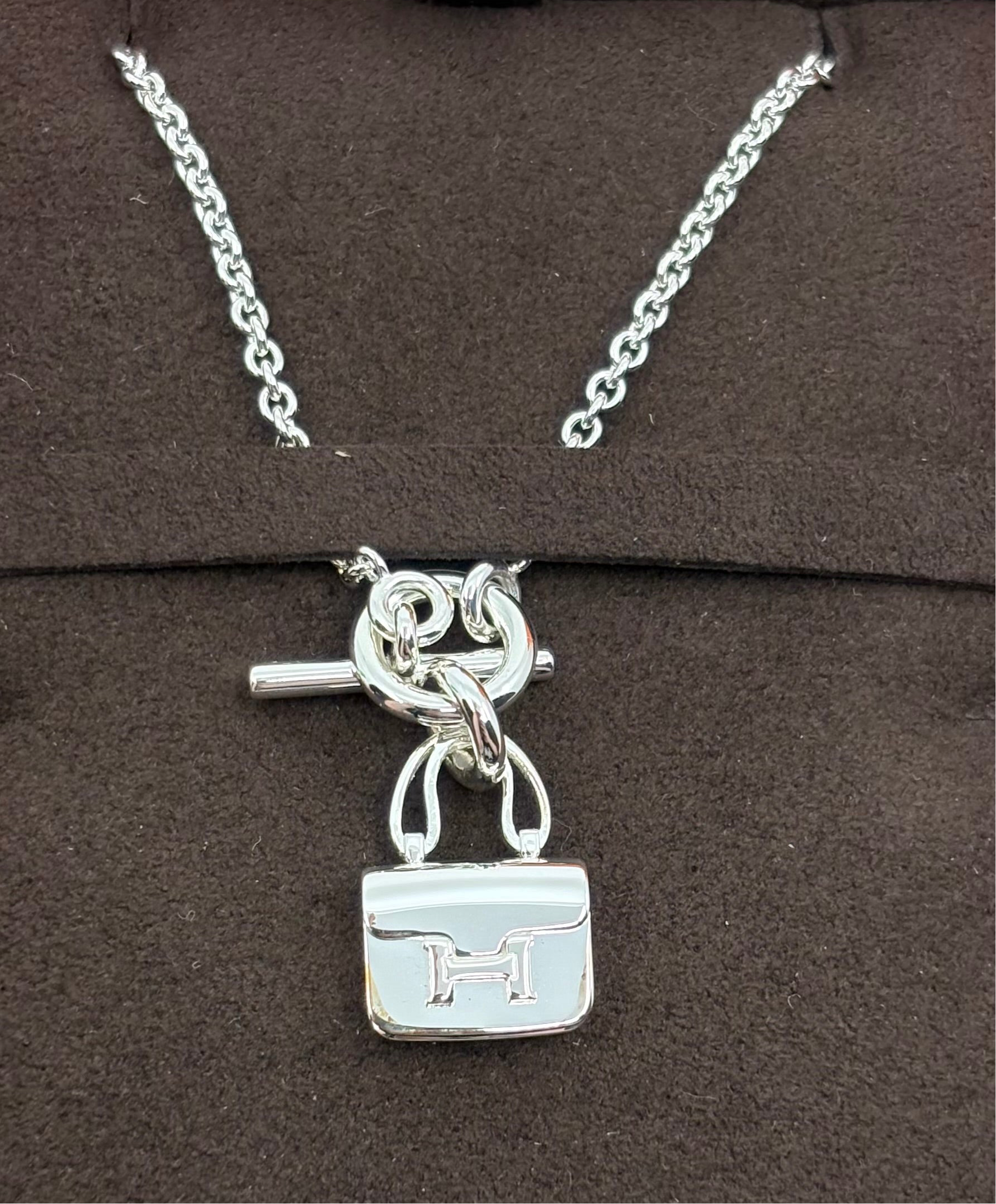 HERMÈS Constance Amulettes Pendant | New