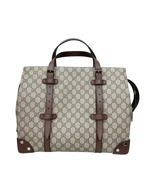 Gucci monogrammed tote bag with leather straps, perfect for supreme tote fans