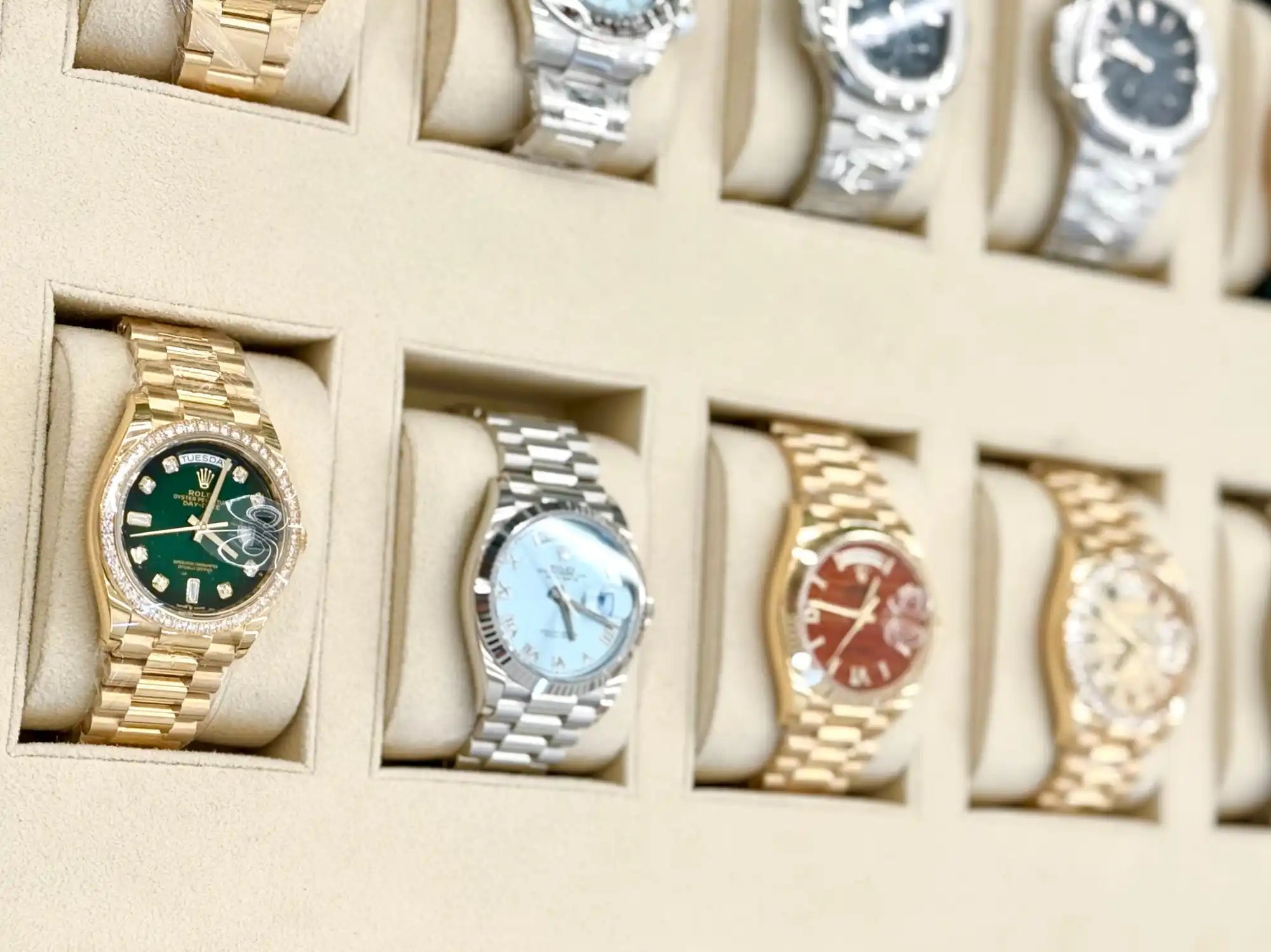 Collection of luxury wristwatches.